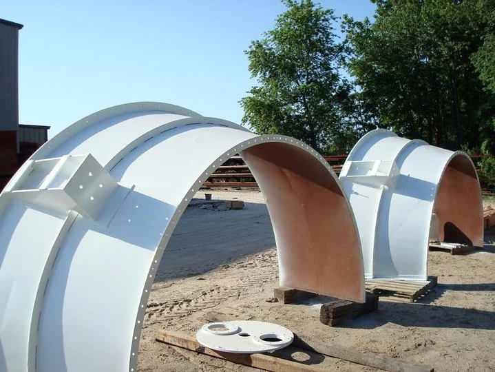 Curved metal duct sections shown in Andrews’ official gallery